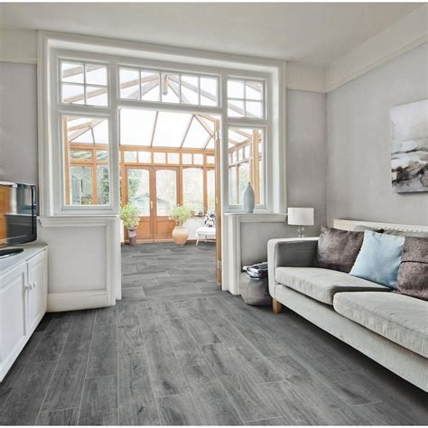 Wood plank porcelain tile can be used as flooring for any room in your home. Rockwood Gray Wood Plank Porcelain Tile | Grey wood tile ...
