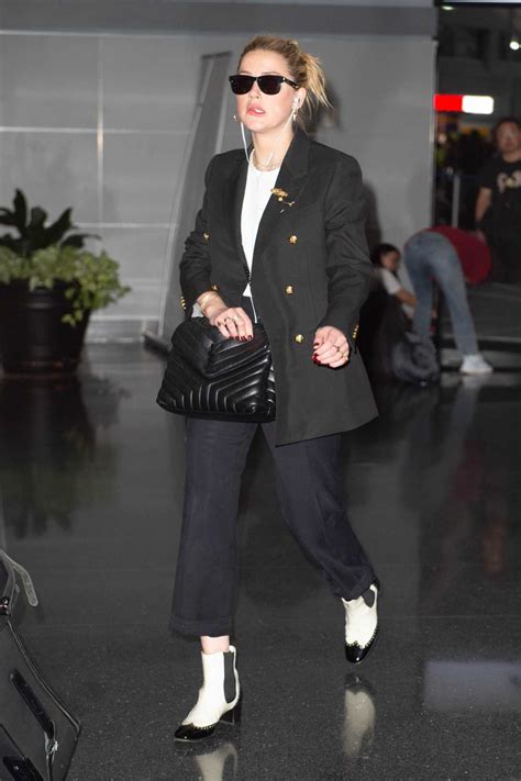 Amber Heard In A Black Suit Arrives At John F Kennedy Airport In New