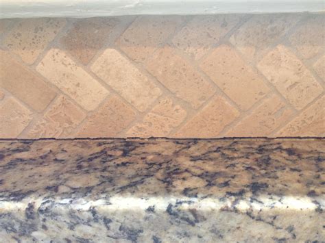 Many silicone caulks are available in a clear finish but depending on the color of the sink and countertops, you may also want to consider a white, black, gray, tan, or almond color. kitchen counters - How to caulk stone backsplash to ...