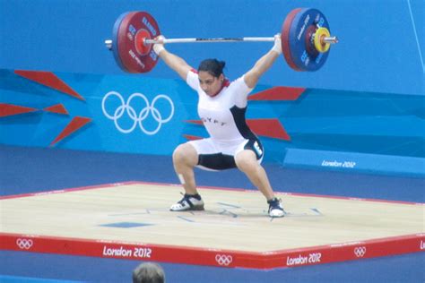 Athletes competed in the same. Weightlifting stays in Olympics, but scrutiny continues ...