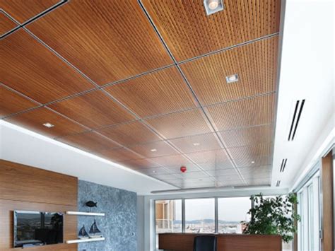 Metal tiles in a variety of finishes cost a little more. wood panel drop ceiling | Dime Store | Drop ceiling tiles ...
