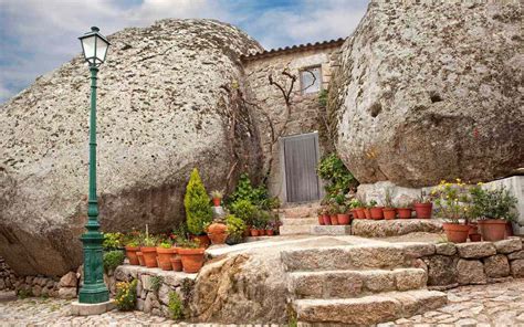 These Houses In Portugal Are Built Into Giant Boulders Travel Leisure
