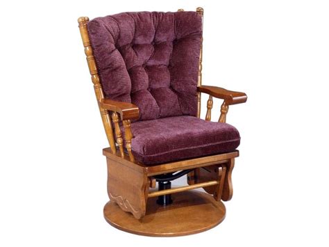 A Wooden Rocking Chair With Purple Upholstered Cushion
