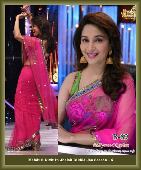 Pretty Actress Madhuri Dixit Wearing A Pink Net Saree