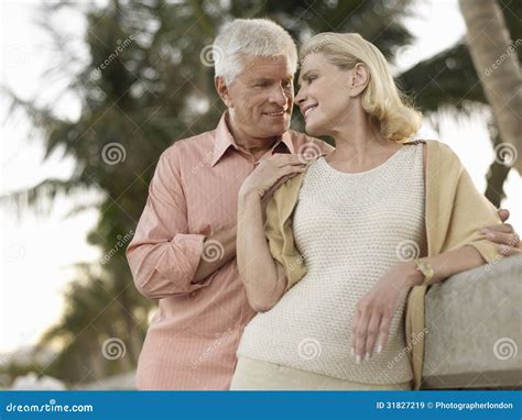 Romantic Senior Couple On Beach Stock Image Image Of Leisure Leaning 31827219