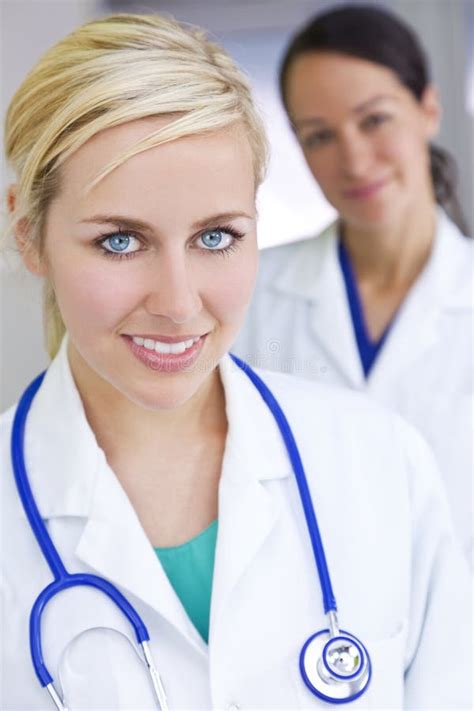 Two Smiling Women Doctors With Stethoscopes Stock Image Image Of