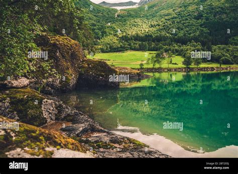 Picturesque Panoramic View Of Norway Natural Resources With Mossy Rocks