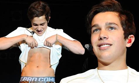 austin mahone pulls a justin bieber by flashing his toned abs on stage daily mail online