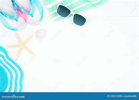 Corner Border Of Summer Vacation Beach Accessories On A White Wood
