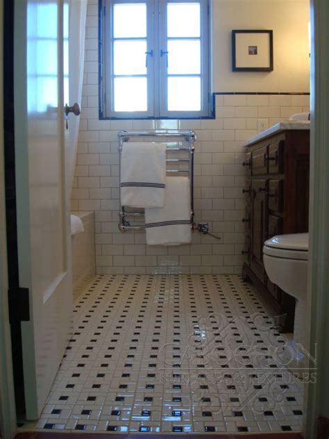 Browse modern bathroom designs and decorating ideas. Bathroom floor in black and white ceramic pinwheel ...