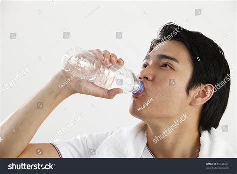 Man Drinking Water From Bottle Stock Photo 85644427