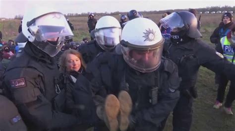 Greta Thunberg Smiles As German Police Carry Her Away During