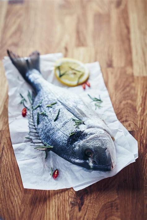 Whole Fresh Raw Fish Ready For Grilling Or Baking Stock Image Image