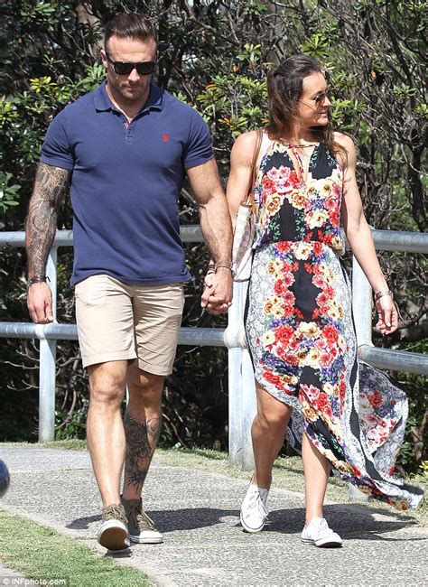 Steve Commando Willis And Lady Love Michelle Bridges Walk Hand In Hand In Bondi Daily Mail