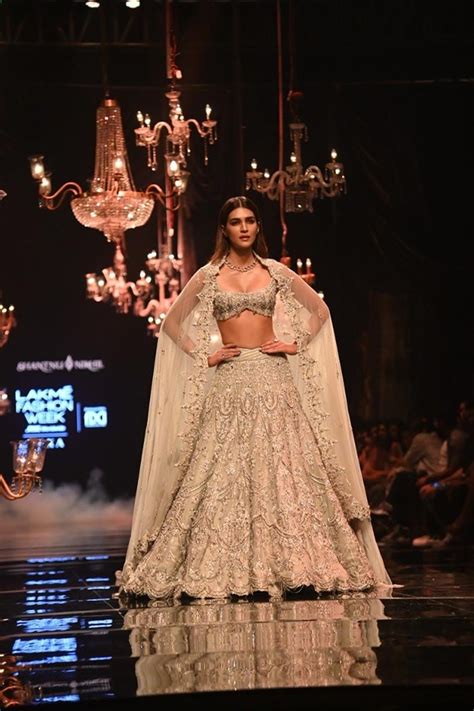 Kriti Sanon Plays The Ultimate Glam Muse In A Scintillating Silver Lehenga For Shantanu And