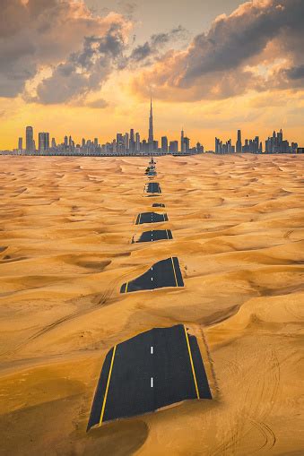 Aerial View Of Dubai Downtown Skyline With Half Desert Sand Road United
