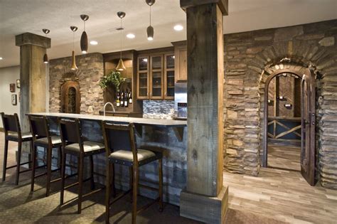 The Custom Cabinets In This Basemente Bar Compliment The Stone Arches
