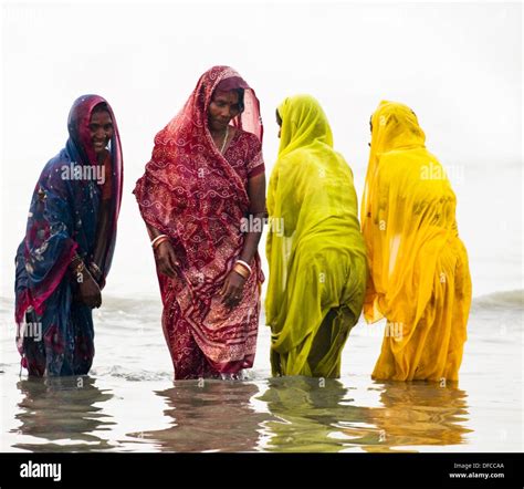Women Bathing In The Holy Water Of Gangasagar Island During The Annual
