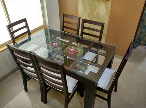 Dining table with glass top