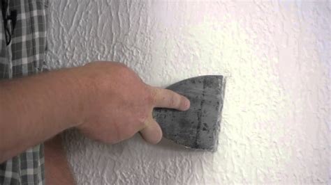 My drywall textured ceiling has water damage from a leak caused by an ice dam. How to Repair Spackling on a Textured Wall : Repairing ...