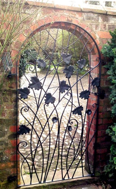 Courtyard Gate With Leaves And Flowers Metal Garden Gates Garden