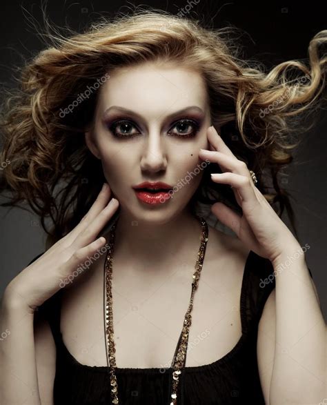 Blond Fashion Model Posing In Studio Stock Photo By ©kanareva 90360448