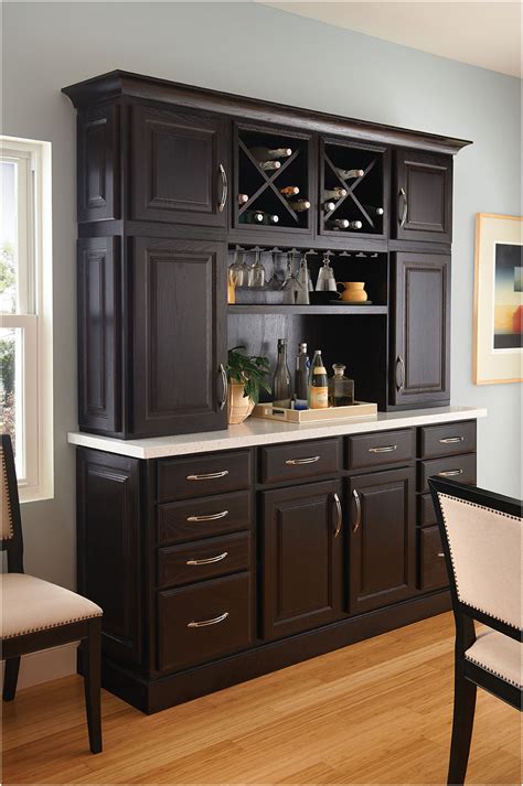 Made from a mix of solid and manufactured wood, this piece strikes a tall and narrow silhouette measuring 72'' h x 31.25'' w x 15.85'' d for a compact footprint. Wooden Kitchen Hutch Cabinets Buffets | Interior Design Ideas