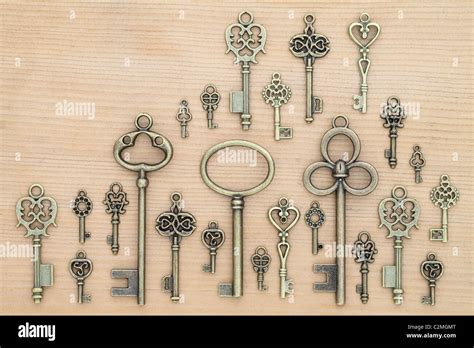 Old Keys On Wooden Table Stock Photo Alamy