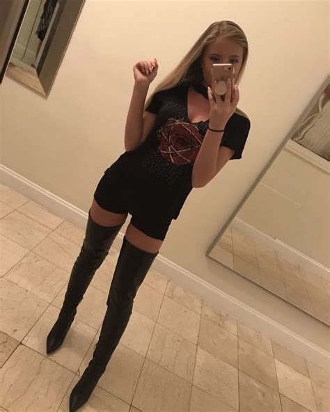 Mirror Selfie Of Blac Thigh High Boots On Bare Legs With Shorts
