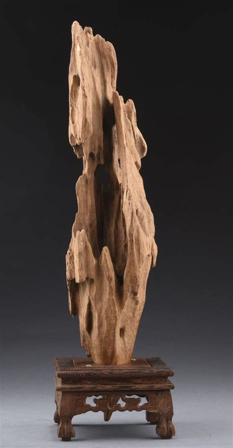 It helps in abdominal distension and helps releasing wind from the intestines. AGARWOOD CARVING WITH STAND