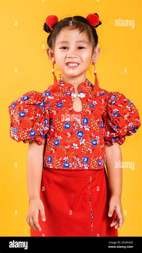 Happy Asian Chinese Little Girl Smile Wearing Red Cheongsam Stock Photo
