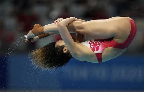 Shi Tingmao Of China Completes Olympic Meter Diving Sweep Ap News