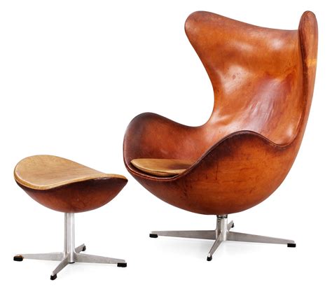 An Arne Jacobsen Brown Leather Egg Chair With Ottoman By Fritz