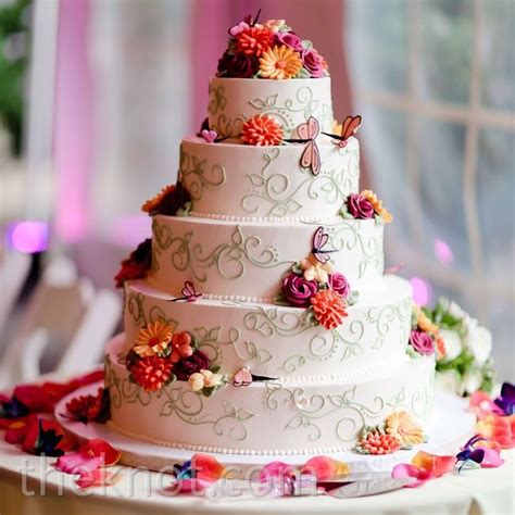 The Five Tiered Wedding Cake Was Topped With Bright Sugar