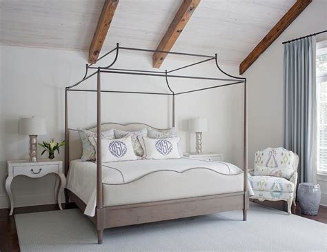 The headboard and footboard feature a lovely sunburst motif, while simple wrought iron posts soar high. Gray Wash Wood Bed with Iron Canopy and White Cabriole ...