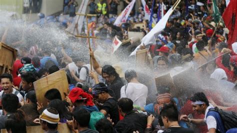 Police Fire Water Cannon On Apec Protesters