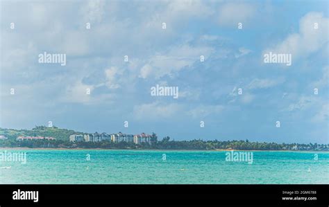 View From Luquillo Beach In Tropical Puerto Rico And White Puffy Clouds