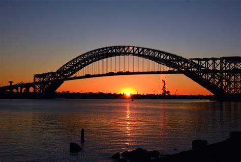 The Sun Sets Under The Bridge Bayonne Bridge Under Constru Flickr