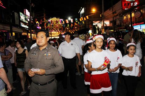 Phuket Tourist Police Parade Through Patong