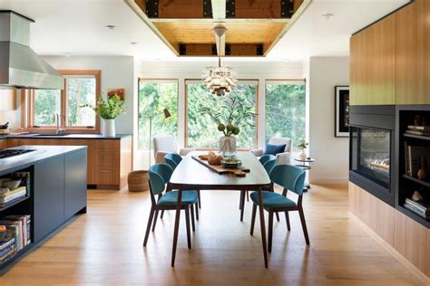 Open Concept Kitchen And Dining Room With Midcentury Modern Furnishings