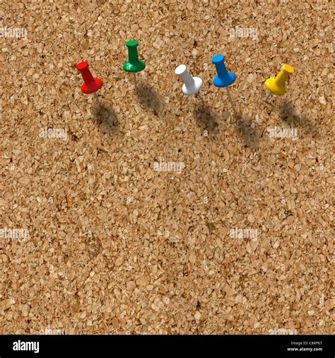 Five Colored Push Pins On A Cork Board Background Stock Photo Alamy