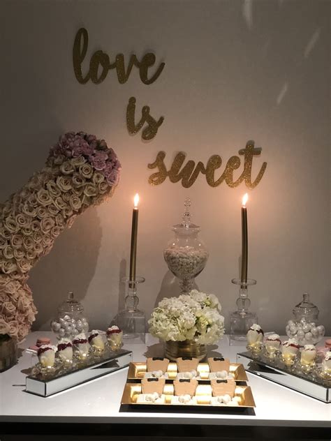 The Dessert Table Is Set Up With Candles Candy And Candies For Valentine S Day