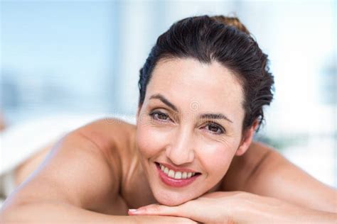 Smiling Brunette Relaxing On Massage Table Stock Image Image Of