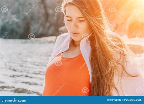 Young Woman In Red Bikini On Beach Girl Lying On Pebble Beach And Enjoying Sun Happy Lady With
