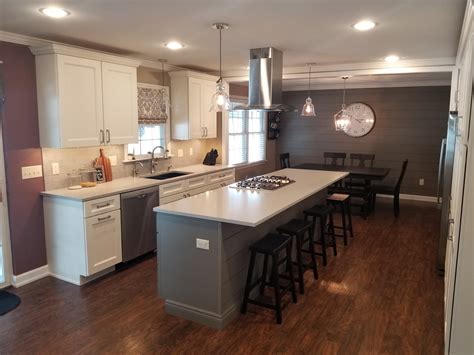 The kitchen island is inlaid and also functional praise for kitchen island remodel. Kitchen Remodel with Cooking Island | Eagle Construction ...