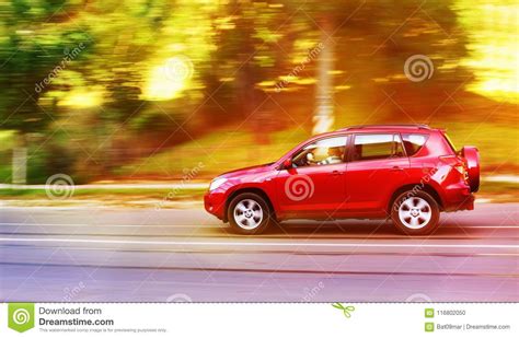 Fast Driving Red Car On The Road At Sunset Editorial Image Image Of
