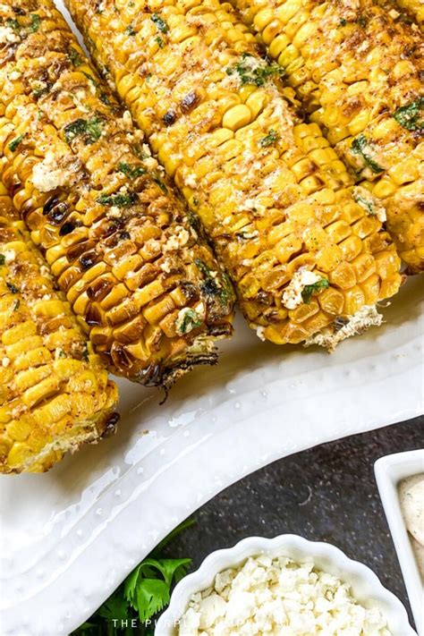 Fully Loaded Mexican Street Corn With Mexican Crema And Cotija Cheese