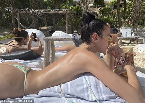 Dua Lipa Flaunts Her Incredible Figure As She Sunbathes Topless And