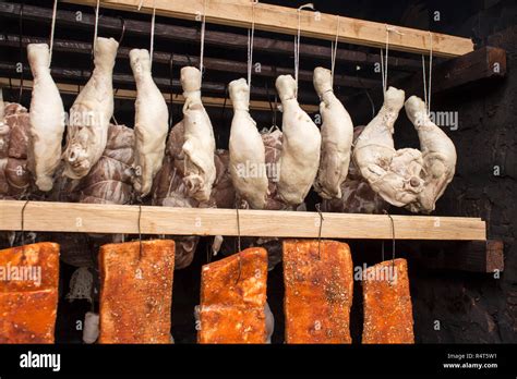 Raw Meat In A Smokehouse Stages Of Smoking Stock Photo Alamy