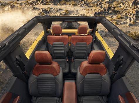 The bronco sport covers a white space in the company's lineup while giving ford customers a versatile option with an attractive footprint. 2021 Ford Bronco 2-door interior 002 - seats - roof off ...